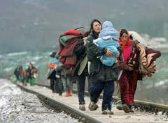 0811-refugees-3-walking-on-