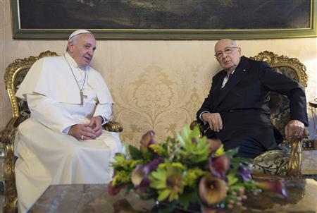 Italy's President Napolitano and Pope Francis talk during a meeting at the Quirinale Palace in Rome
