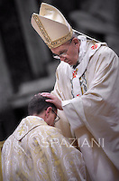 Pope Francis confers episcopal ordination at St Peter's basilica at the Vatican on October 24, 2013