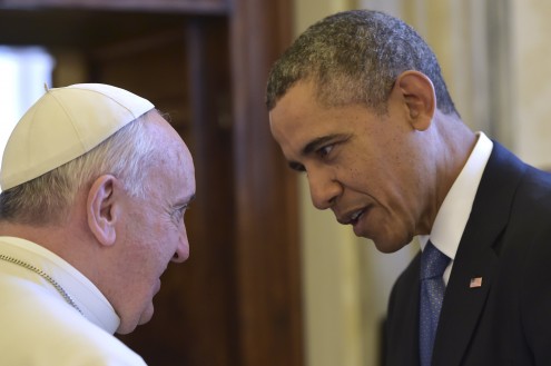 Pope Francis talks with U.S. President Obama during a private audience at the Vatican City