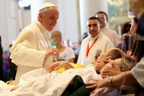 PopeFrancis-blessing-sick-patient
