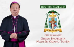 Huy hiệu và khẩu hiệu của Đức Giám mục Gioan Baotixita Nguyễn Quang Tuyến
